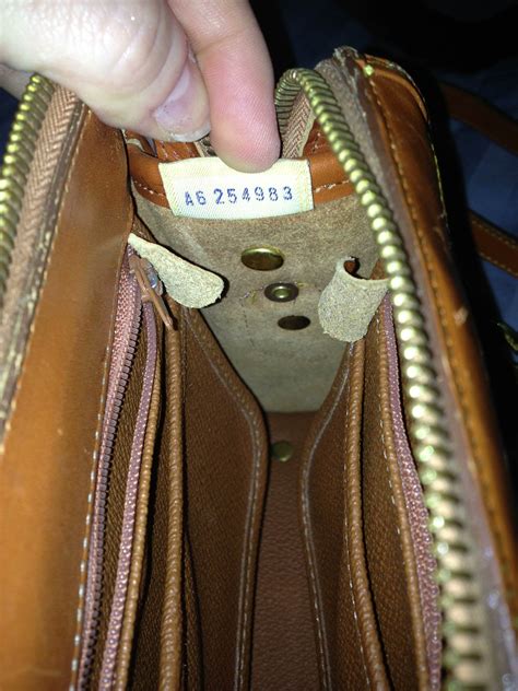 how to spot a fake dooney & bourke purse|dooney and bourke purses real.